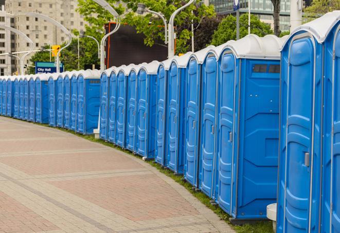 a row of sleek and modern portable restrooms at a special outdoor event in Dana Point CA